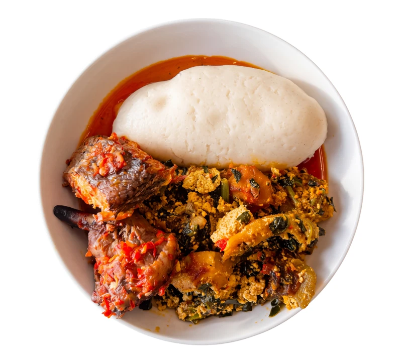 Nigerian egusi soup with pounded yam at D'lara Kitchen in Winnipeg