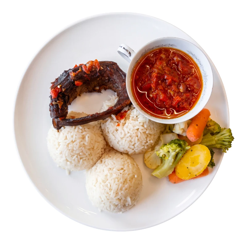 Nigerian coconut rice with two proteins at D'lara Kitchen in Winnipeg