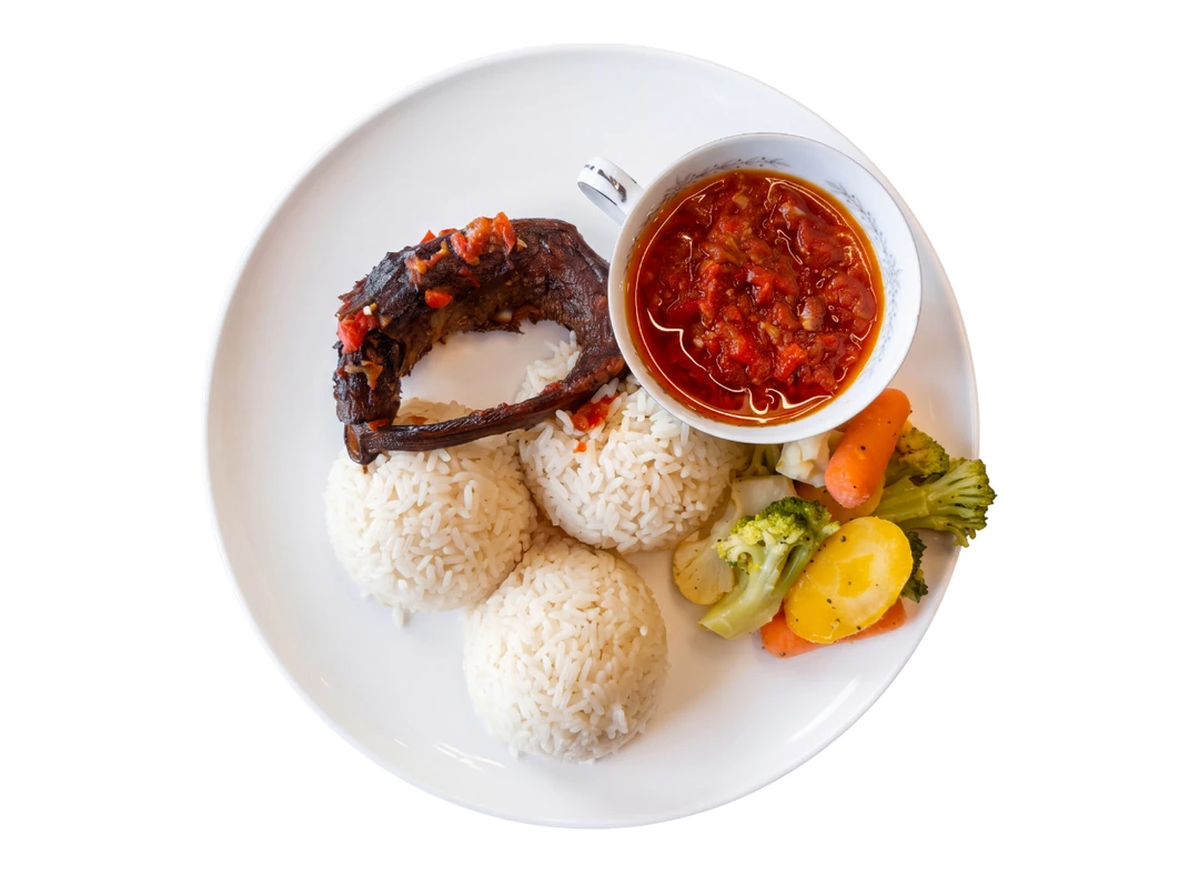 Nigerian coconut rice with 2 proteins at D'lara Kitchen in Winnipeg