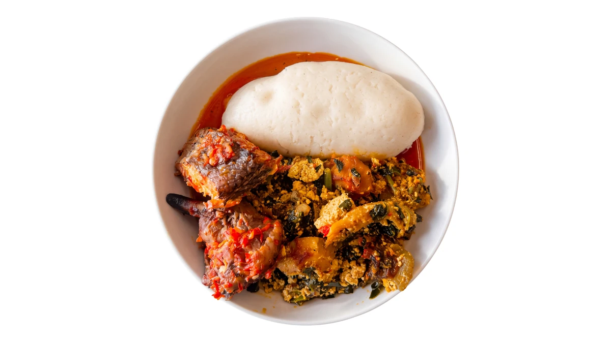 Nigerian semolina egusi soup with pounded yam at D'lara Kitchen in Winnipeg